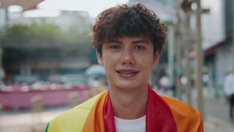 man with lgbtq pride flag