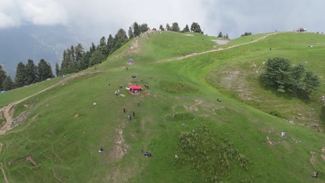 hikers reaching mushkpuri summit | drone footage of trekking adventure