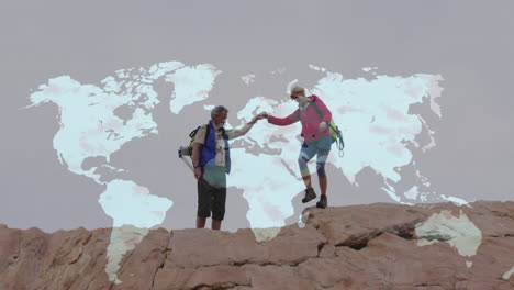 caucasian senior couple hiking holding hands on cliff, over moving world map