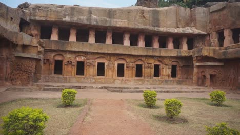 Slow-tracking-shot-into-an-ancient-hand-carved-cave-temple