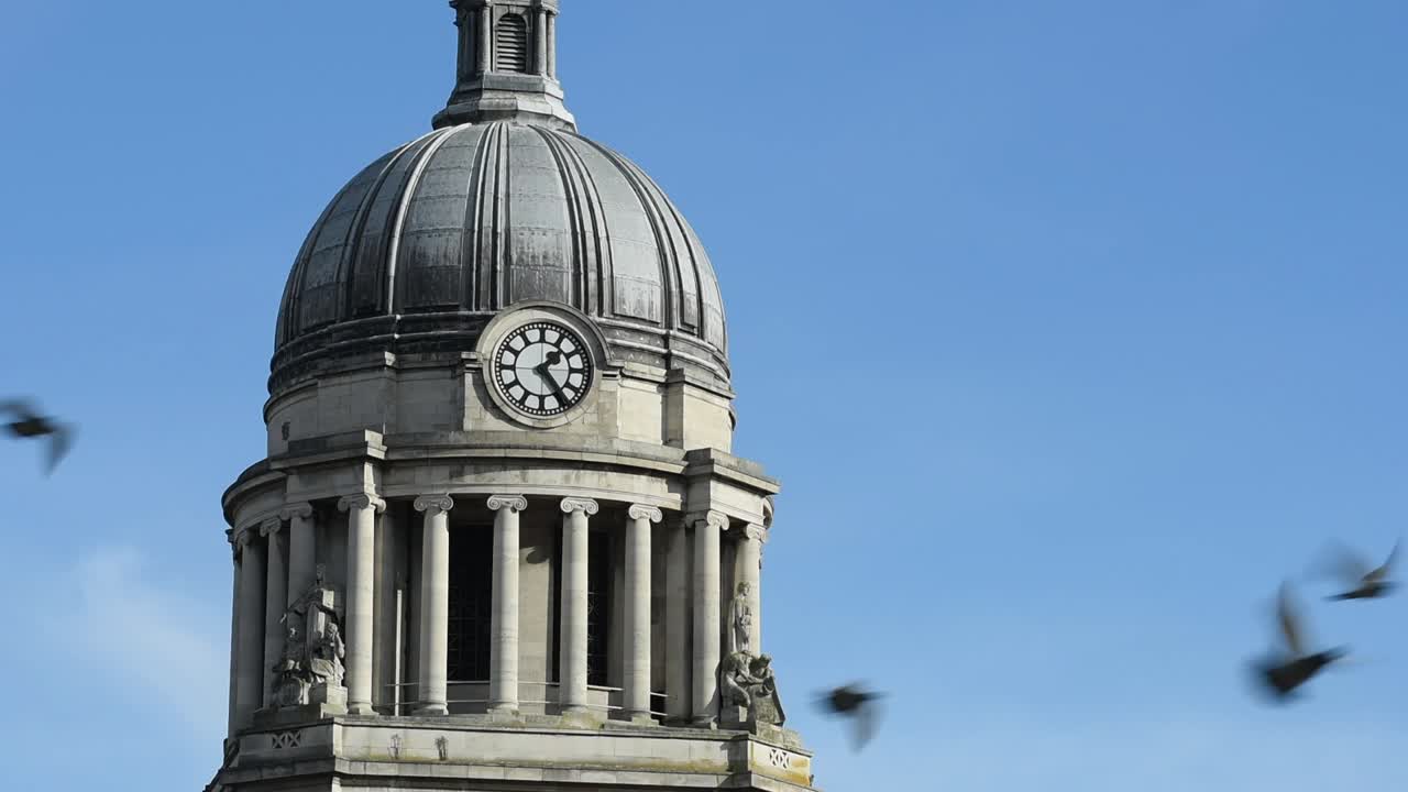 Close-up view of the historic Council House Clock, a landmark in Old Market Square at the heart of Nottingham city centre, England, highlighting its architectural details