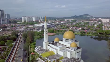 lake mosque against subway station and residential area