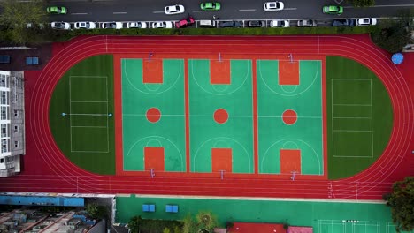 basketball court and sports facility complex in chengdu, china - aerial drone top down view