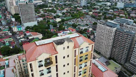 overhead aerial view of condo buildings and urban communities in west crame, san juan city, philippines