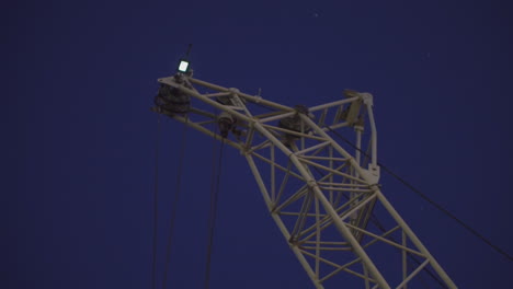crane arm at night