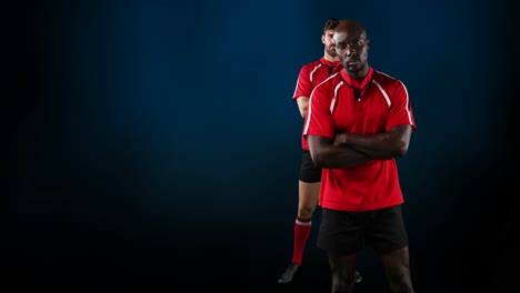 Animation-of-diverse-rugby-players-over-black-background