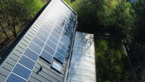 orbiting around modern house with solar panels on roof