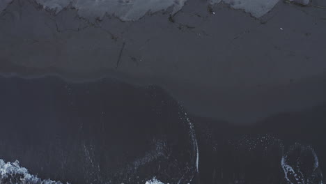 dark beach aerial view