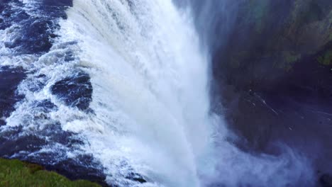 Famous-And-Dramatic-Waterfall-Skogafoss-In-Iceland---aerial-drone-shot