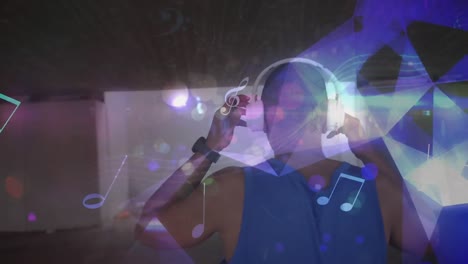 animation of musical notes and shapes moving over male athlete in headphones training outdoors