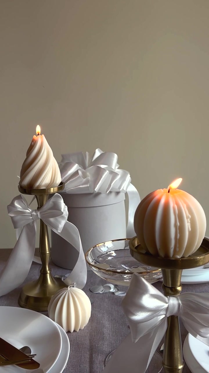 Elegant Table Setting with Burning Decorative Candles and Gift Box