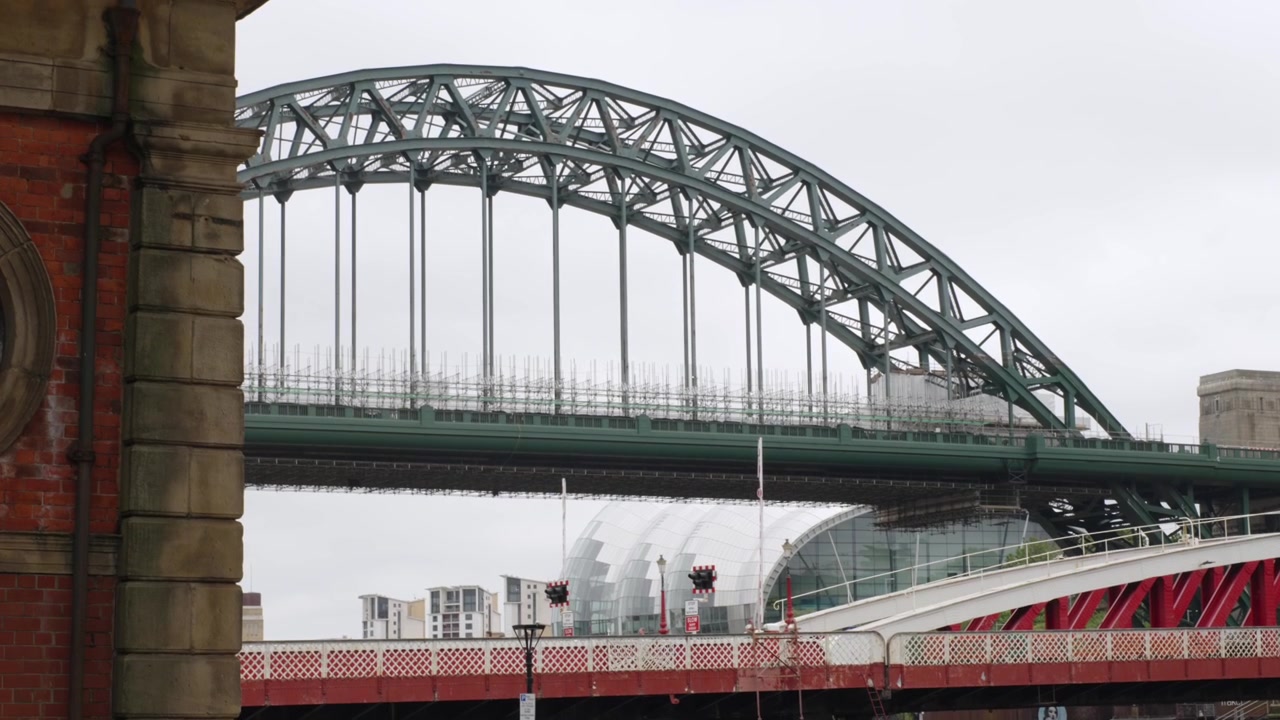 Tyne Bridge and GlassHouse International Centre for Music in Newcastle, North East England, highlighting the city’s historic engineering and modern waterfront architecture