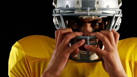 american football player with a head gear 4k