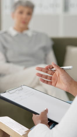 therapist talking to patient in therapy session