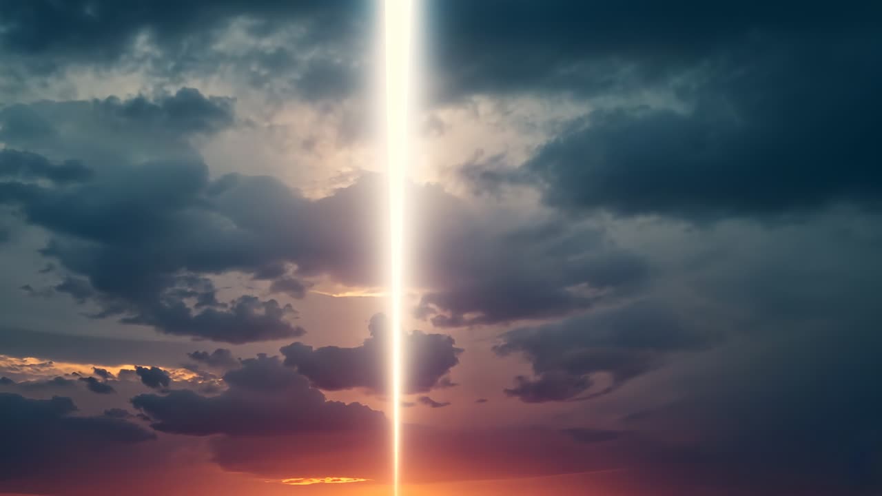 Brightening vertical light column illuminating storm clouds at sunset horizon, showing red flares