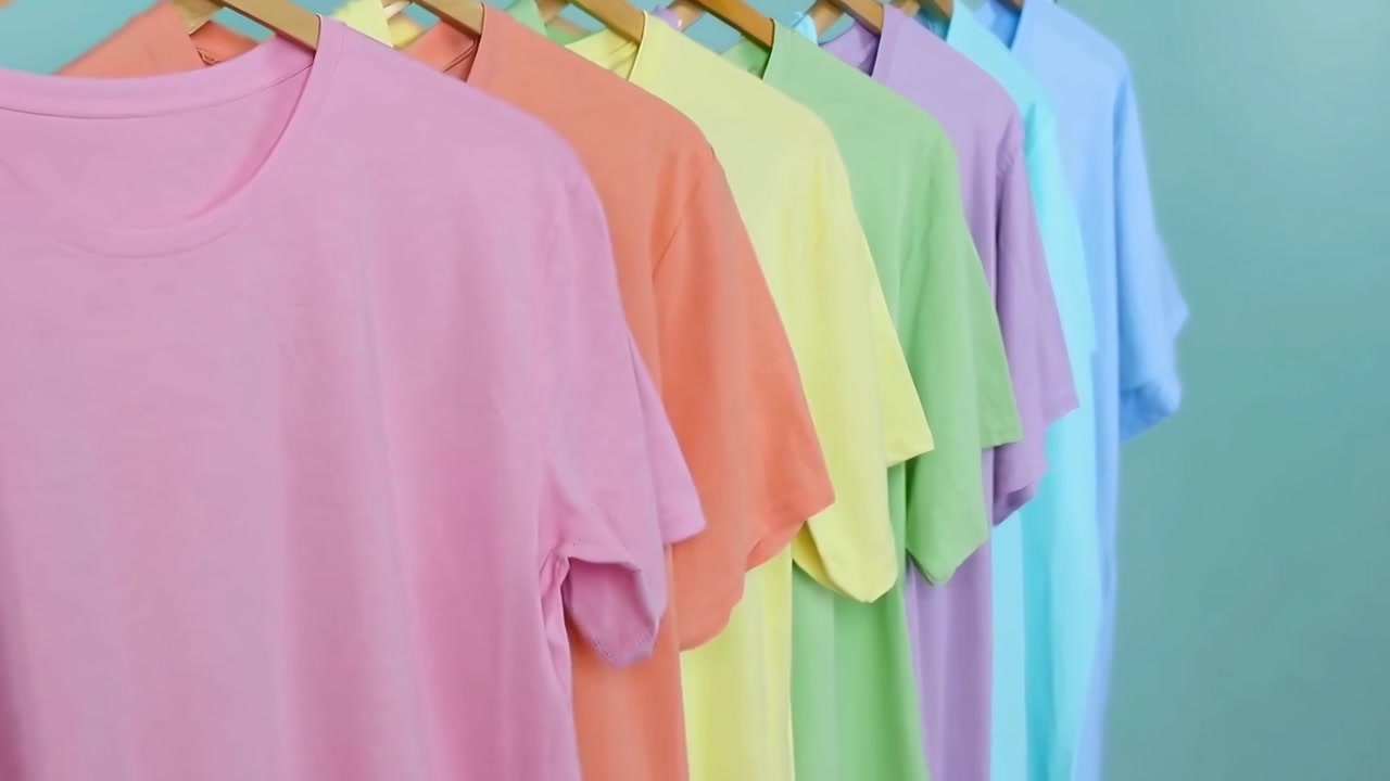 Colorful Pastel T-Shirts Hanging on a Clothes Rack