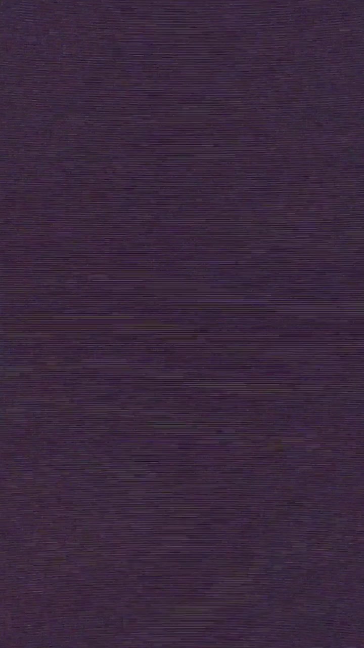 Authentic VHS tape noise with color bleeding, scan lines, and static glitch effects. Seamless loop for creating a retro 80s or 90s television look. Use as an overlay or background, vertical format
