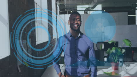 animation of data processing with scope scanning over african american businessman
