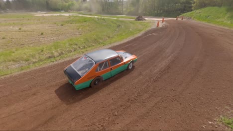 rally car speeding on a dirt road