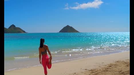 woman exercising in the beach 4k