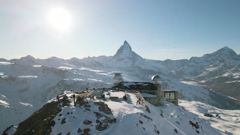 Aerial-Pullback-Reveals-Gornergrat-Observation-Platform,-Matterhorn-Background