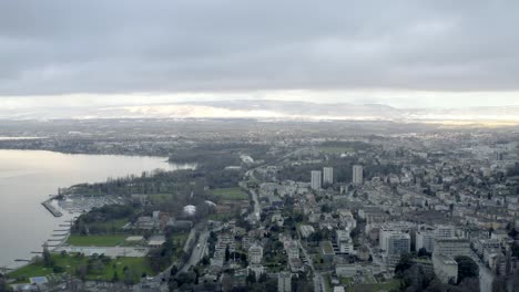 Drone-Aerial-of-the-beautiful-swiss-city-center-of-lausanne-located-on-the-lake-geneva-in-Switzerland-during-winter,-Europe