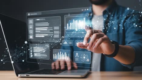 engaging with innovative data visualizations through interactive touch interfaces on a laptop, bridging digital and physical realities.