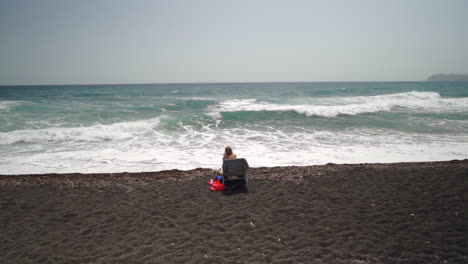 one woman with one dog sitting on a