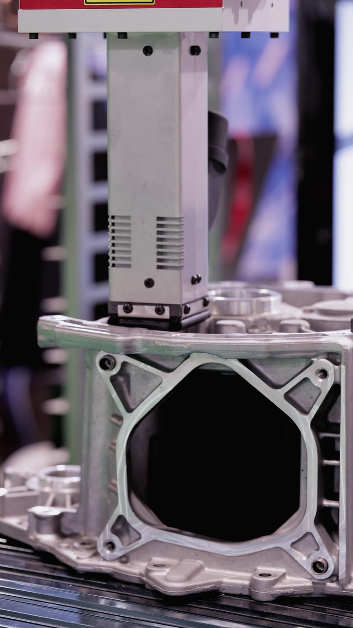Automated Robotic Arm Inspecting Metal Engine Component in Factory