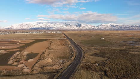 Flying-over-Gentile-Street-Road-in-Syracuse-Utah---Truck-Right-Movement