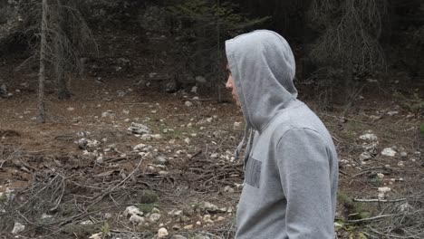 hooded man hiking