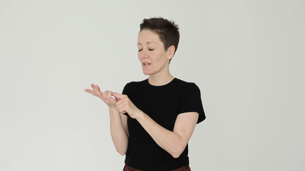 Woman pointing with short hair