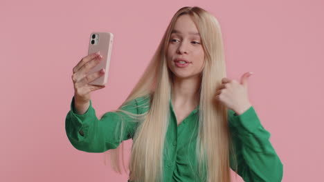 happy woman girl traveler blogger taking selfie on smartphone communicating video call online stream