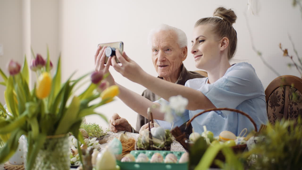 Senior Man And Woman Taking Selfie Photo At Easter Holidays 1