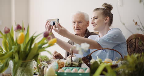 senior man and woman taking selfie photo at easter holidays 1