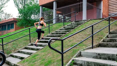 female athlete going up and down stairs outdoors