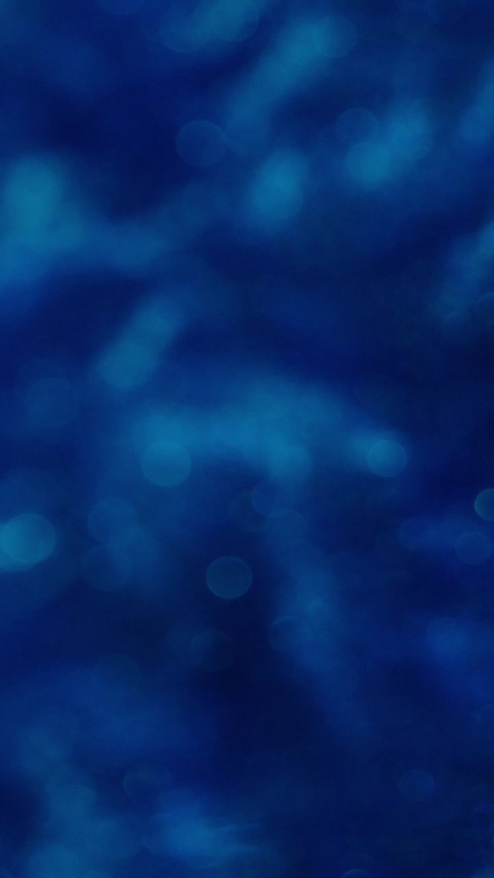 Sfondo bokeh blu scuro