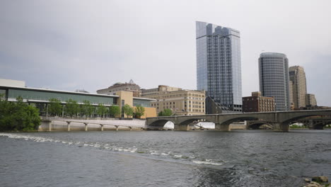 wide angle shot of a river flowing though an urban downtown environment