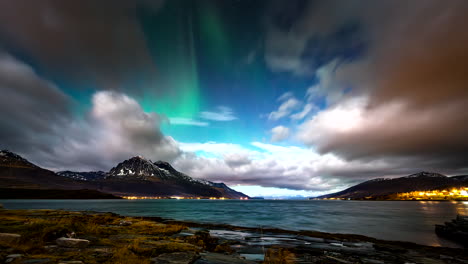 northern lights, aurora borealis during winter in hella, iceland. timelapse