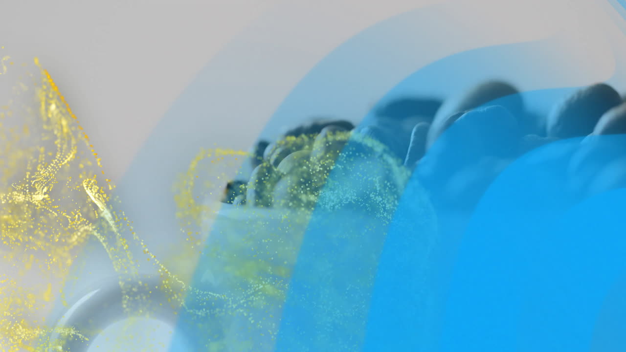 Central 3D abstract cluster floating under blue arches while yellow particles swirling around