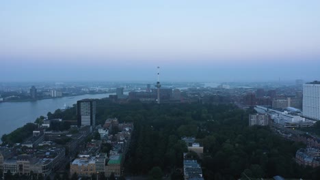 Aerial-flyover-Euromast-Tower-in-Rotterdam-City-during-cloudy-day-in-the-morning