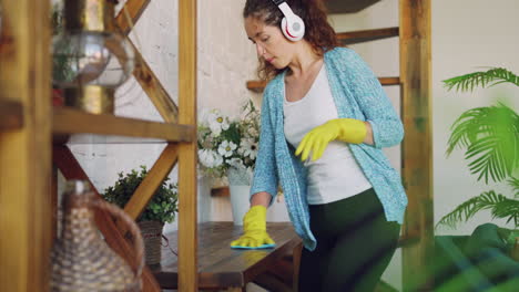 woman cleaning shelves