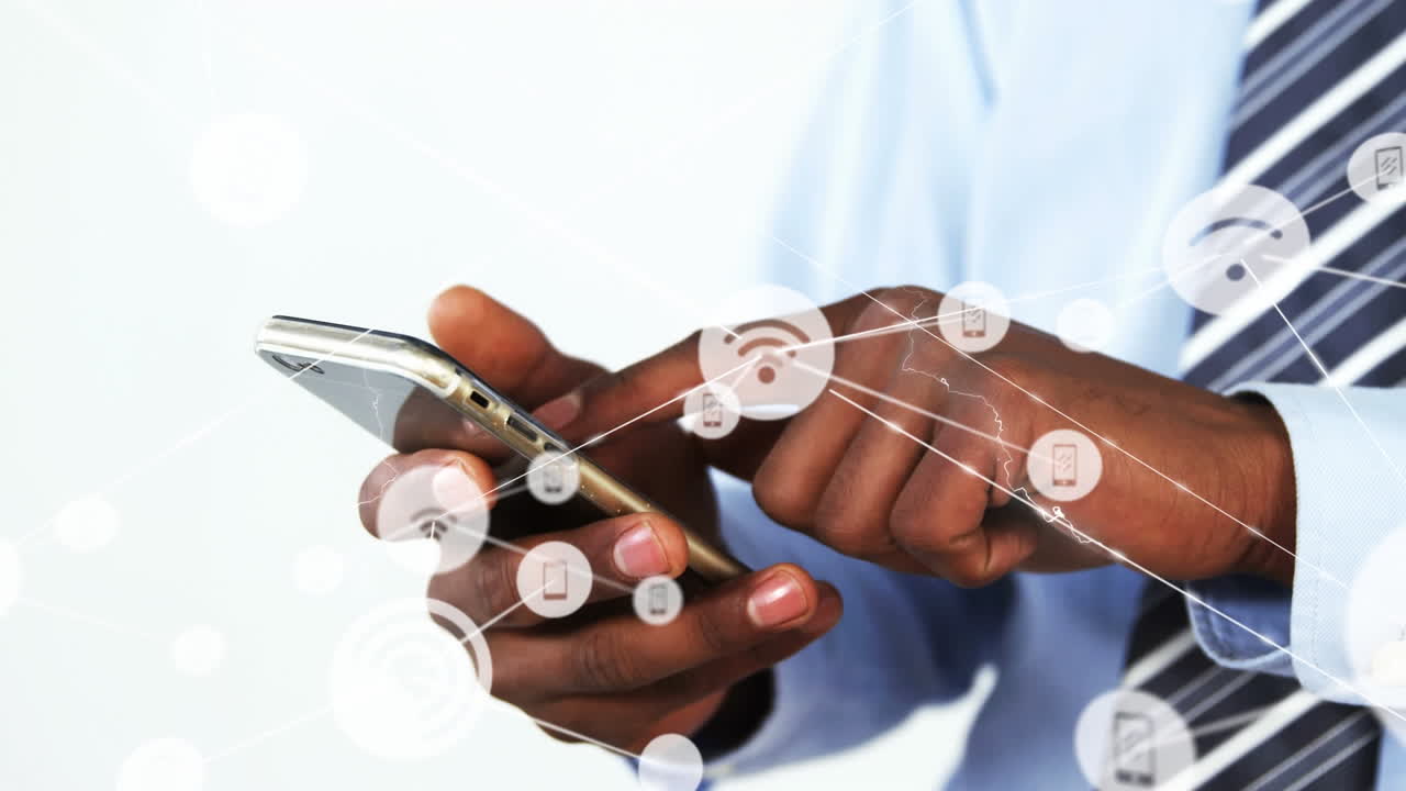 Animation of connections over hands of african american man using smartphone