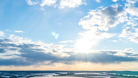 simultaneous movement of clouds of different levels, time intervals, beautiful pre-sunset landscape loop video