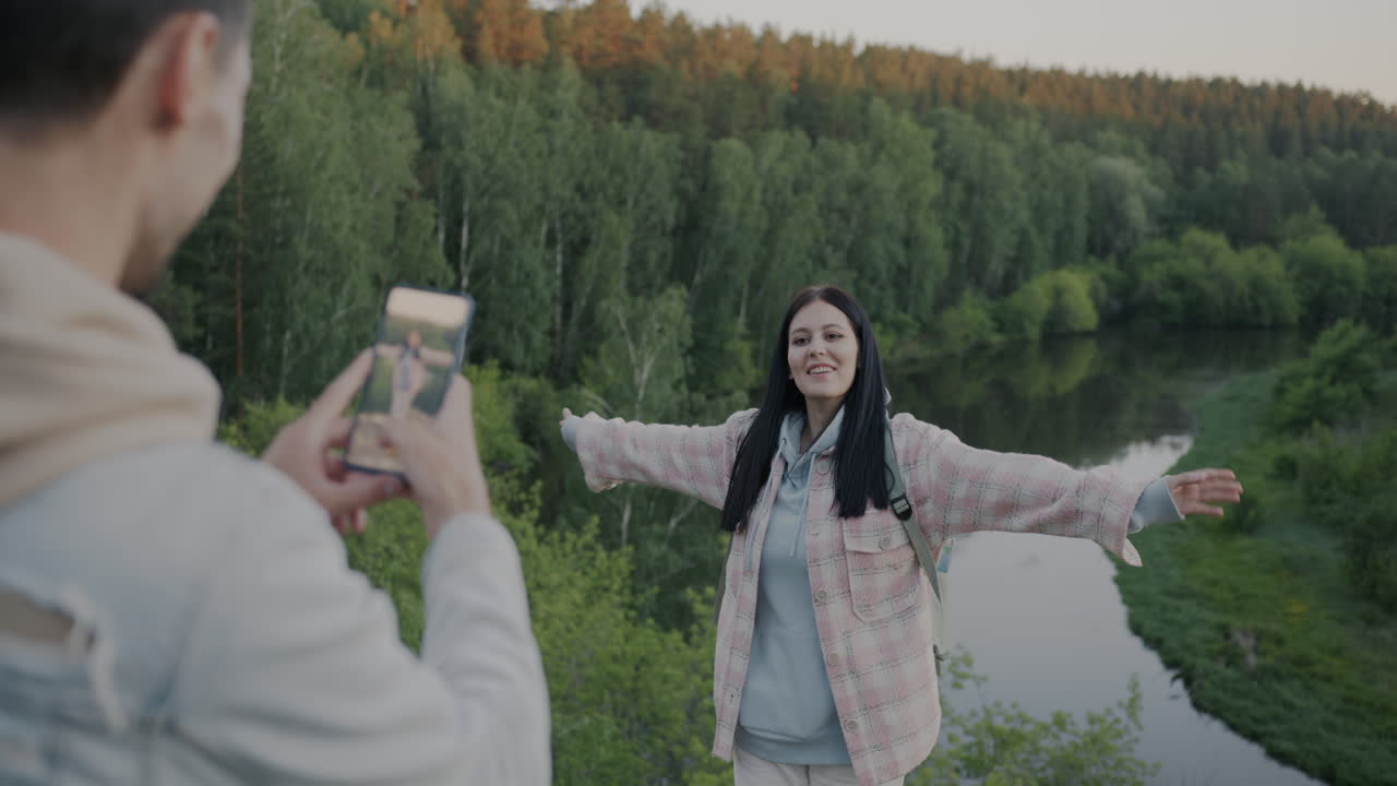 Couple taking photo in nature