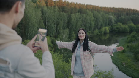 couple taking photo in nature