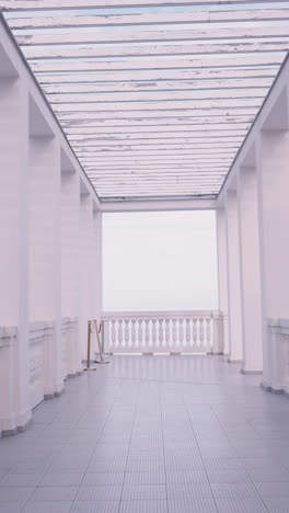 white corridor with balcony