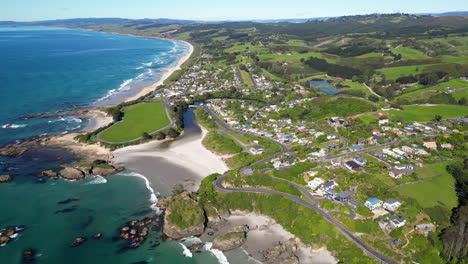 establishing aerial, drone view of shoreline by the city of brighton in new zealand