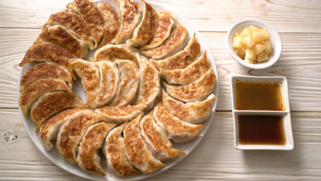 fried gyoza or dumplings snack with soy sauce in japanese style