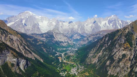 drone shot flying through the aosta valley in italy